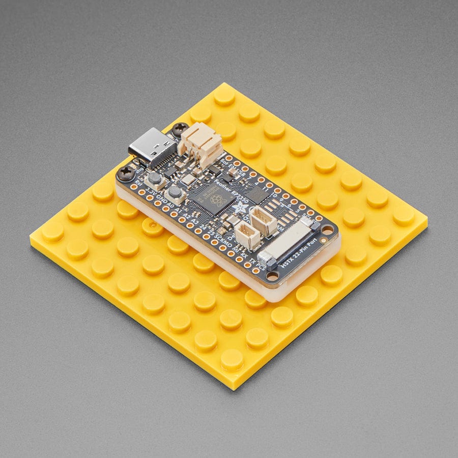 Adafruit Feather Mount for LEGO-Compatible Brick Systems by Adafruit - The Pi Hut