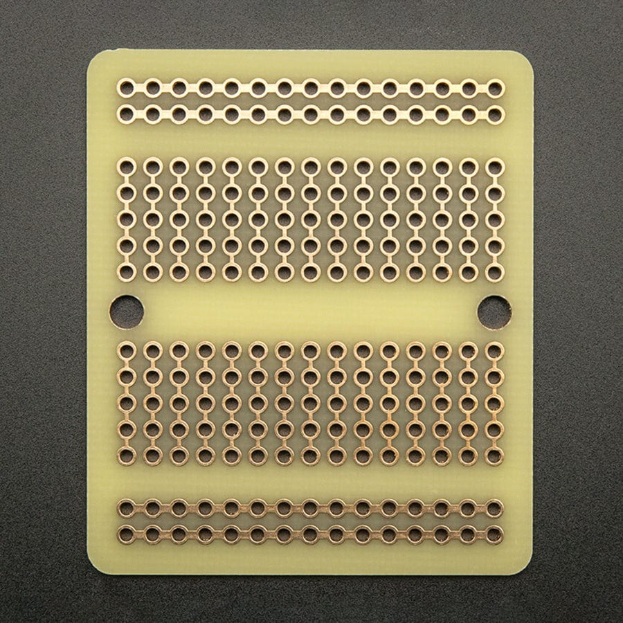 Adafruit Perma-Proto Quarter-sized Breadboard PCB - Single by Adafruit - The Pi Hut