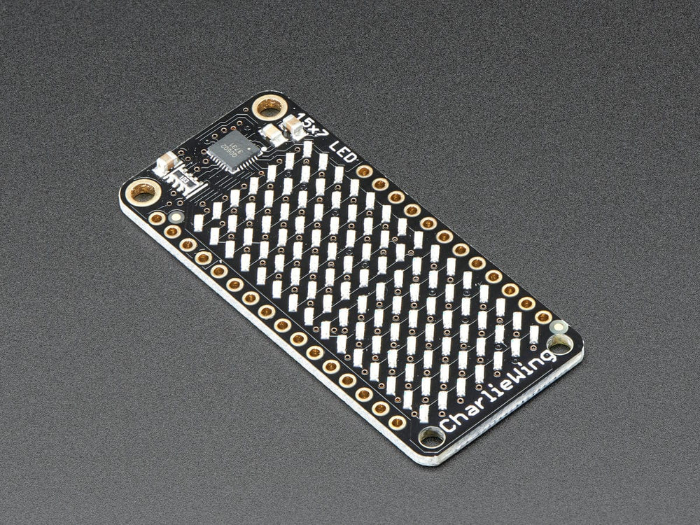 Adafruit 15x7 CharliePlex LED Matrix Display FeatherWing - Green by Adafruit - The Pi Hut