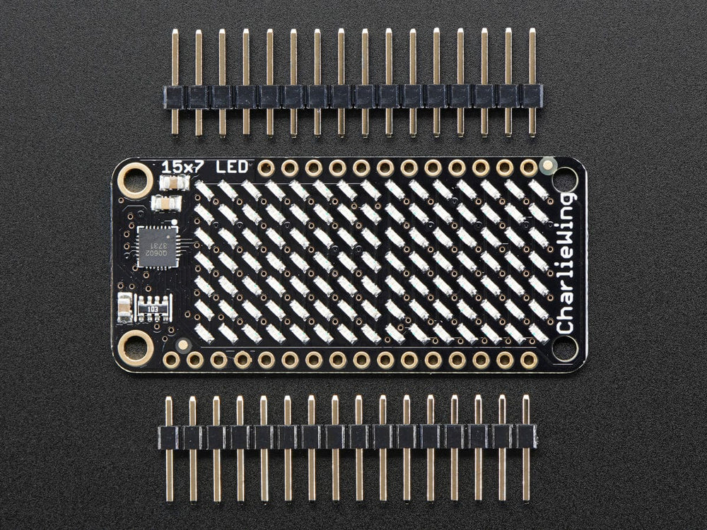 Adafruit 15x7 CharliePlex LED Matrix Display FeatherWing Yellow by Adafruit - The Pi Hut
