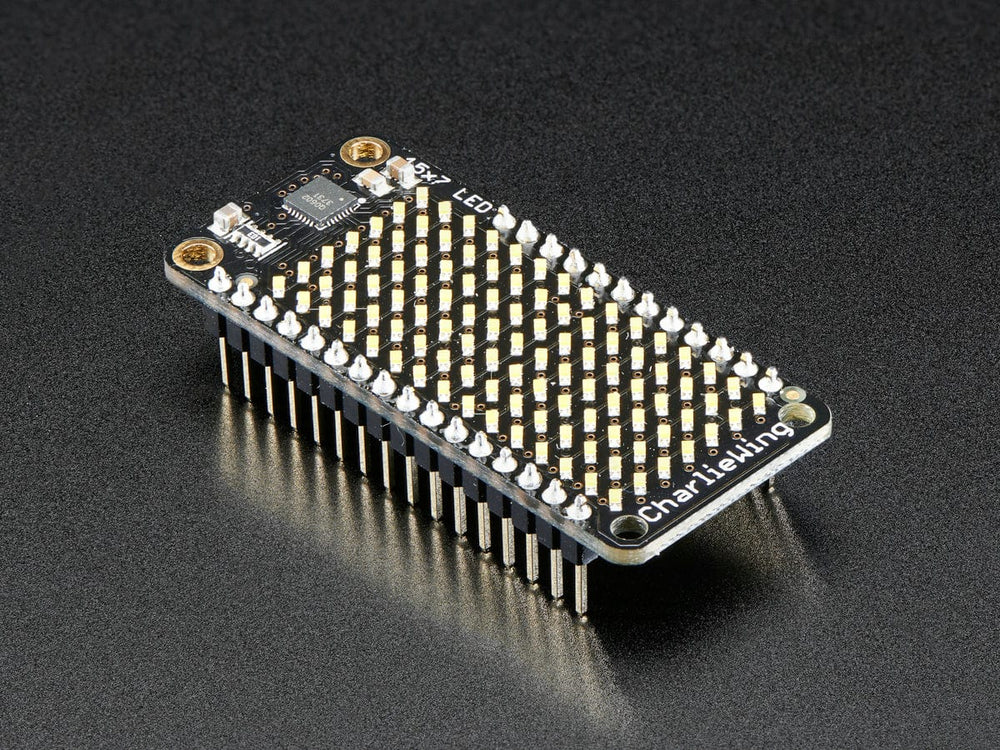 Adafruit 15x7 CharliePlex LED Matrix FeatherWing - Warm White by Adafruit - The Pi Hut