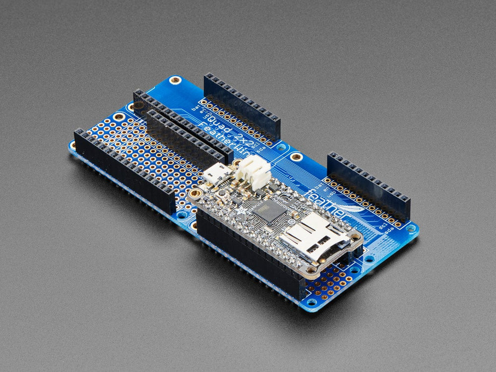 Adafruit Quad 2x2 FeatherWing Kit with Headers by Adafruit - The Pi Hut