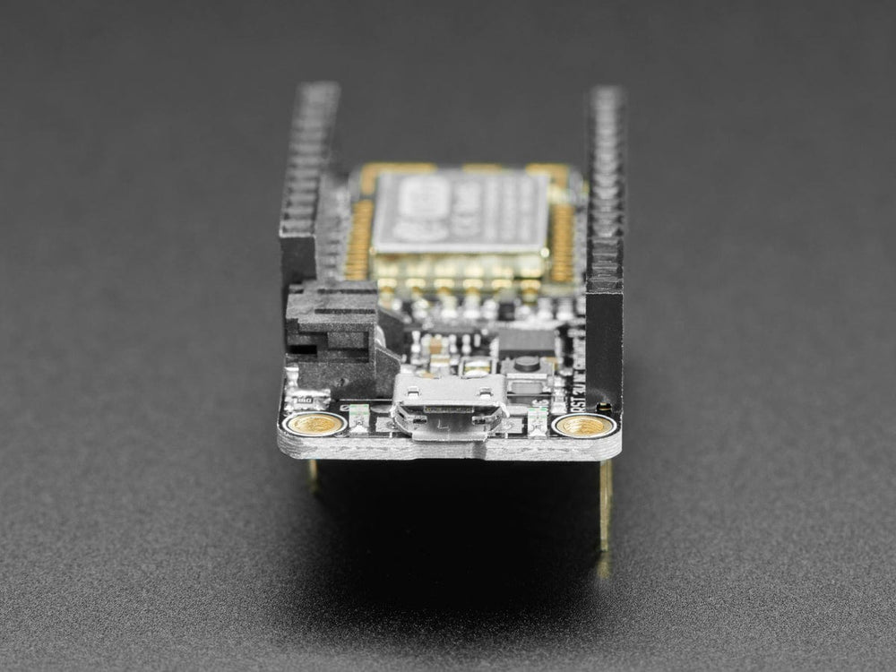 Assembled Feather HUZZAH w/ ESP8266 WiFi With Stacking Headers by Adafruit - The Pi Hut