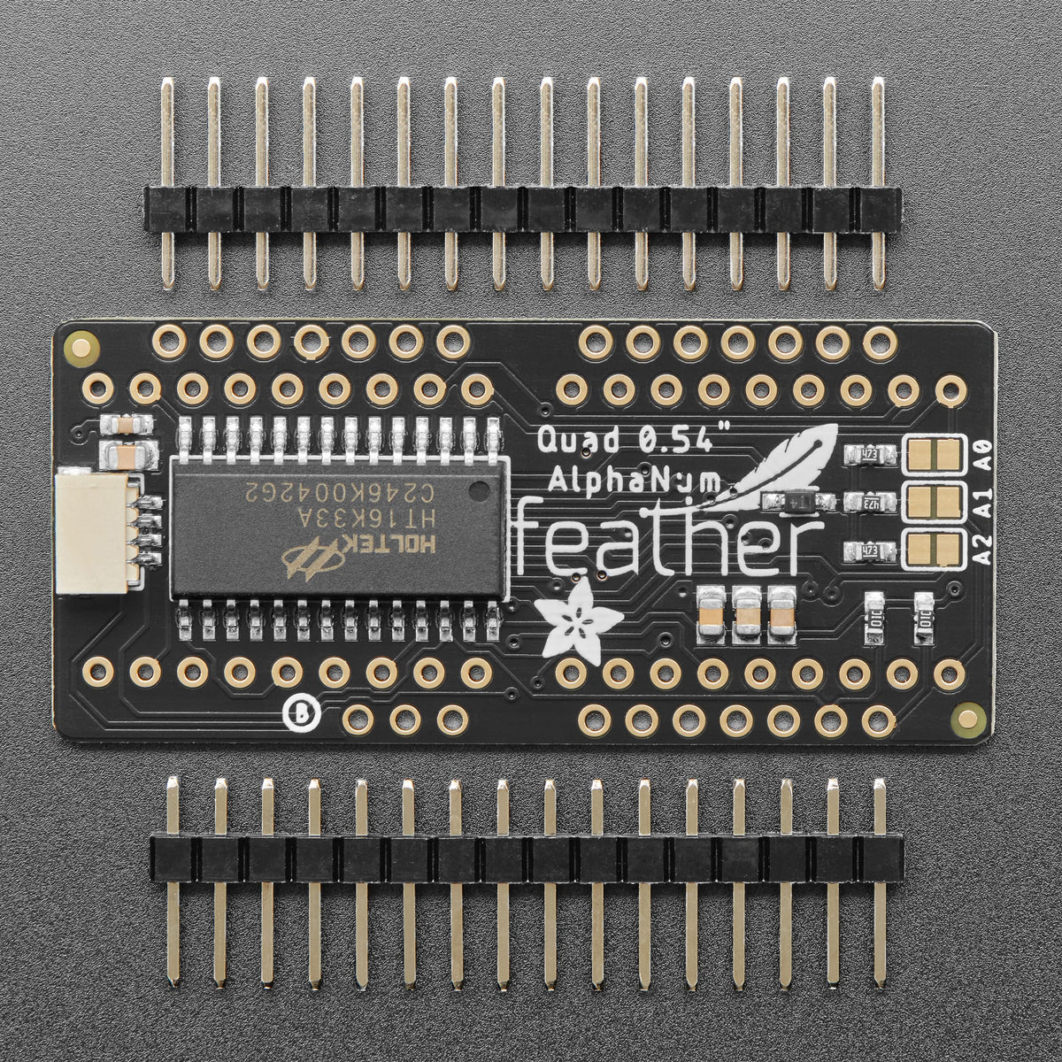 Adafruit 0.54" Quad Alphanumeric FeatherWing Display - Green by Adafruit - The Pi Hut