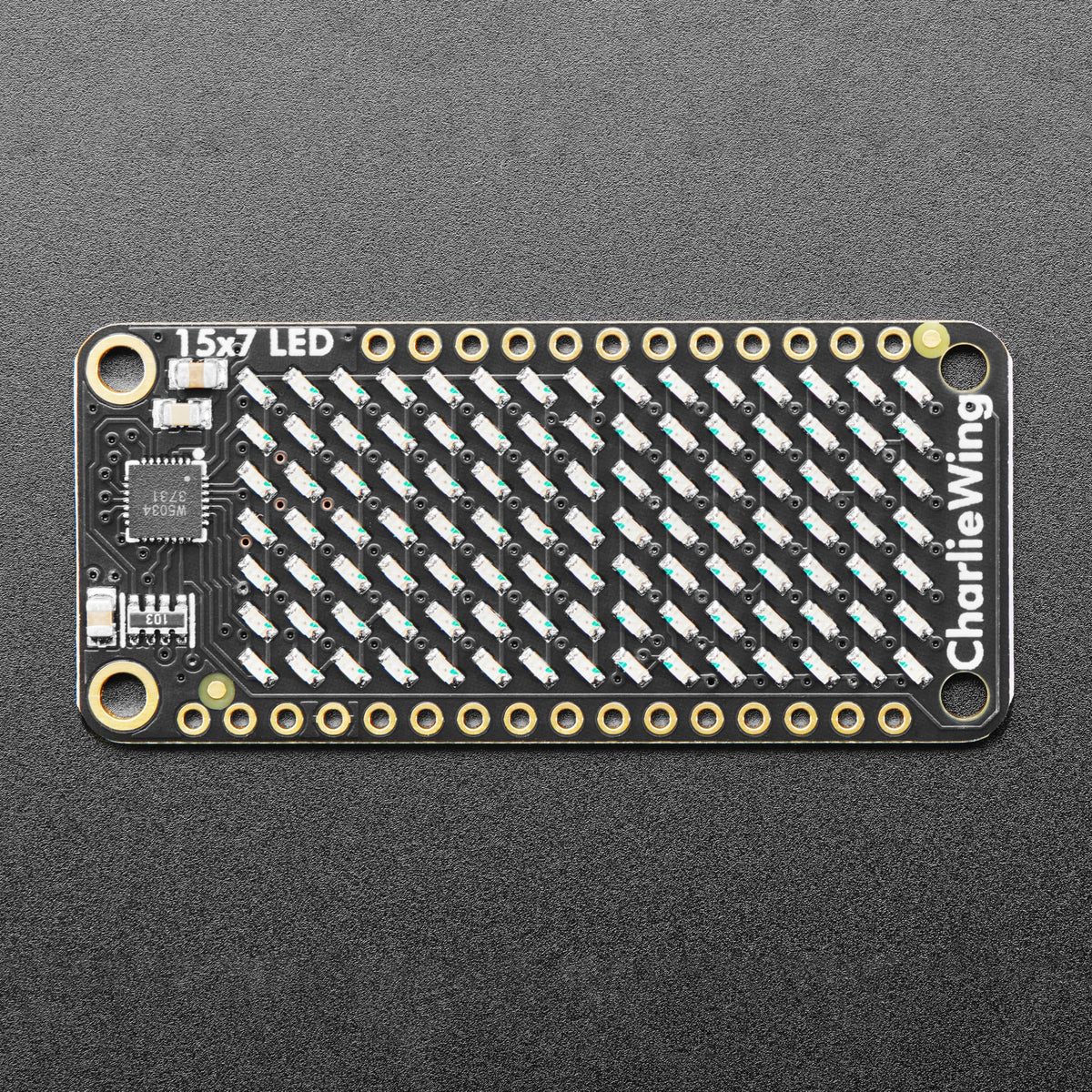 Adafruit 15x7 CharliePlex LED Matrix Display FeatherWing - Red by Adafruit - The Pi Hut