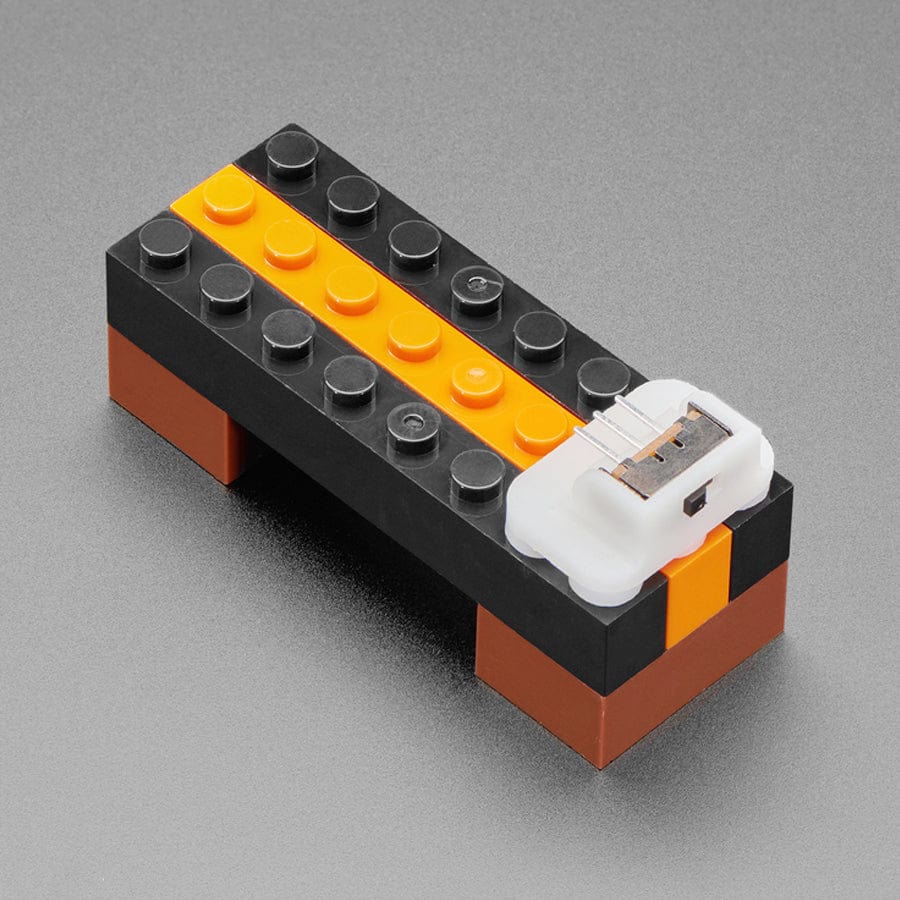 Slide Switch Mount for LEGO-Compatible Brick Systems